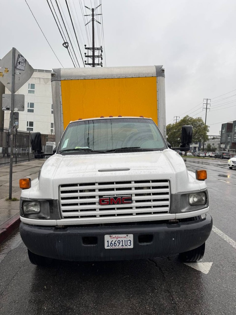 Front view of a professional moving truck on a city street